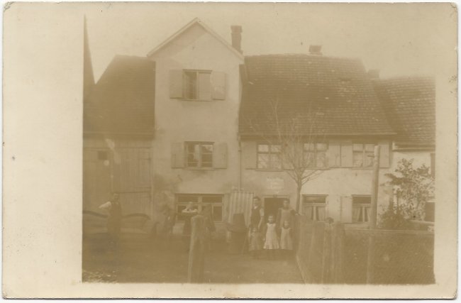 Laupheim - Geschäft Sattler u. Tapezierer (Vorderseite der Ansichtskarte)